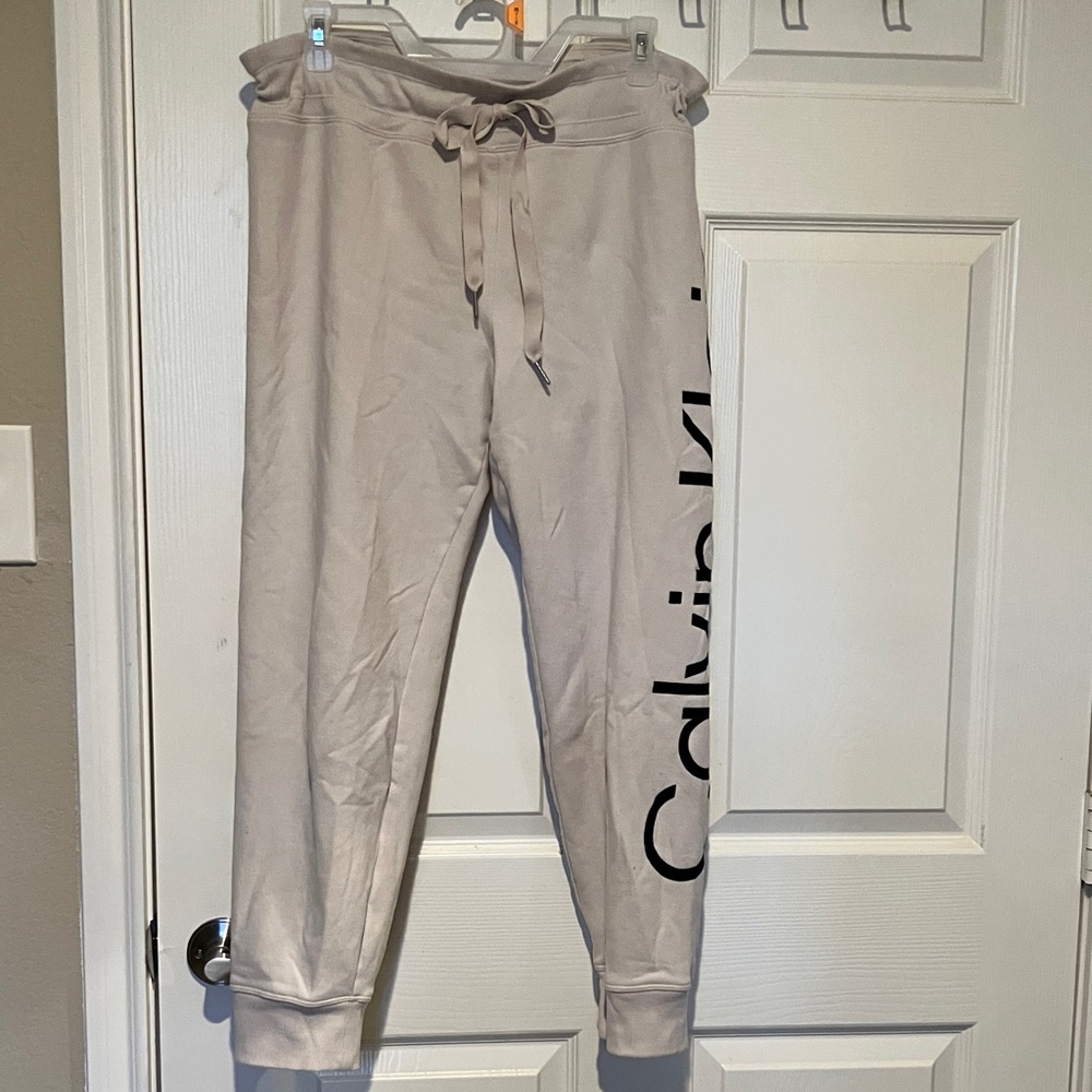 3/$45 Cavin Klein Performance Joggers Cream Color w/Raised Black CK Logo size Lg